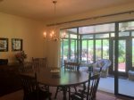 Dining area off the kitchen with wooden table and 5 chairs
